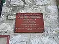 Memorial plaque on the wall of the Saints Peter and Paul church in Tsyhany