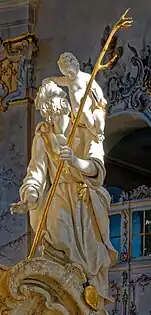 St Christopher carrying a stick and the Christ Child