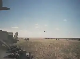8 SAI Ratel IFVs on a training range in a mechanised assault, Lohatla Army Battle School, 1993