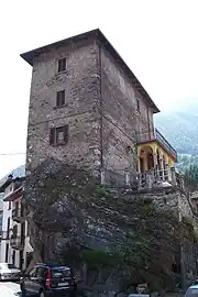 House on the cliff in Dezzo