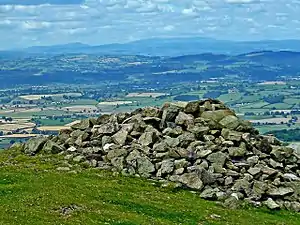 Cairn at summit of Corndon Hill looking over Montgomeryshire towards the Berwyns