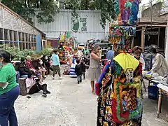 A community celebration at Sure We Can in the garden community space