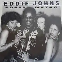 Johns surrounded by female background vocalists, Paris Metro album cover