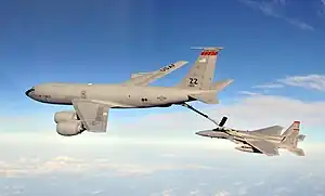 A F-15C Eagle is refueled by a KC-135R Stratotanker, both aircraft are from the 18th Wing based at Kadena Air Base, Japan.