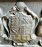 On a plaque to Alfred Beit under Beit Arch