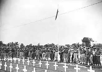 Australian troops inspecting the Labuan War Cemetery after its opening ceremony on 10&nbsp;September 1945