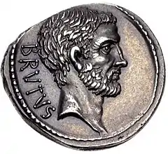 Coin depicting bearded man with stern expression facing right