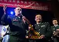 A Chinese military official with the Director of the Band of WMD, Colonel Sergei Vovk.