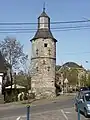 Tower of the former de la Torre castel (French: Château-ferme de la Torre), 16th century.