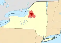 Map of New York State showing the greater Tug Hill region (light red), and its heavily forested "core" region (dark red). Core area based upon The Nature Conservancy's 150,000-acre (610 km2) delineation.
