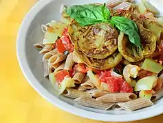 Penne with eggplant and basil in yogurt-tomato sauce.