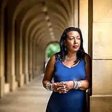 Photograph of SuAndi standing outside Manchester Town Hall Extension