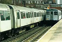 Two electric multiple unit trains with large windows