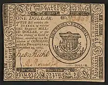 A one-dollar note issued by the Second Continental Congress in 1775 with the inscription: "ONE DOLLAR. THIS Bill entitles the BEARER to receive ONE SPANISH MILLED DOLLAR, or the Value thereof in Gold or Silver, according to a Resolution of CONGRESS, passed at Philadelphia November 29, 1775.." ; Within border cuts: "Continental Currency" and "The United Colonies". ; Within circle: "DEPRESSA RESURGIT". ; Verso: "ONE DOLLAR. PHILADELPHIA: Printed by HALL and SELLERS. 1775."