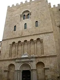 Its northern facade with narrow windows and columns.