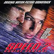 The faces of Jason Patric and Sandra Bullock and shown among streaks of diagonal lines in blue and orange. In white text, the top reads "Original Motion Picture Soundtrack" and right side reads "Rush Hour Hits the Water". The bottom reads "Speed 2" and "Cruise Control" in red text.
