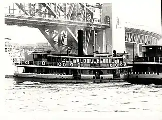 Kookooburra (centre) and another K-class ferry 4 months prior to the opening of the Sydney Harbour Bridge. Note Kookooburra's pointed stems in comparison the other K-class rounded stem.