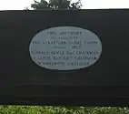 Plaque attached to non-towpath (south) side of trough